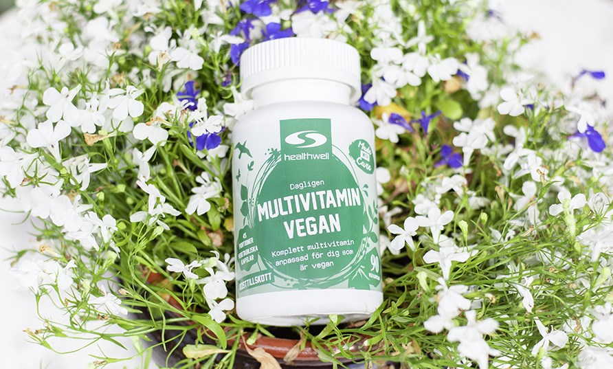 Multivitamin Vegan -purkki kukkien ymprimn.